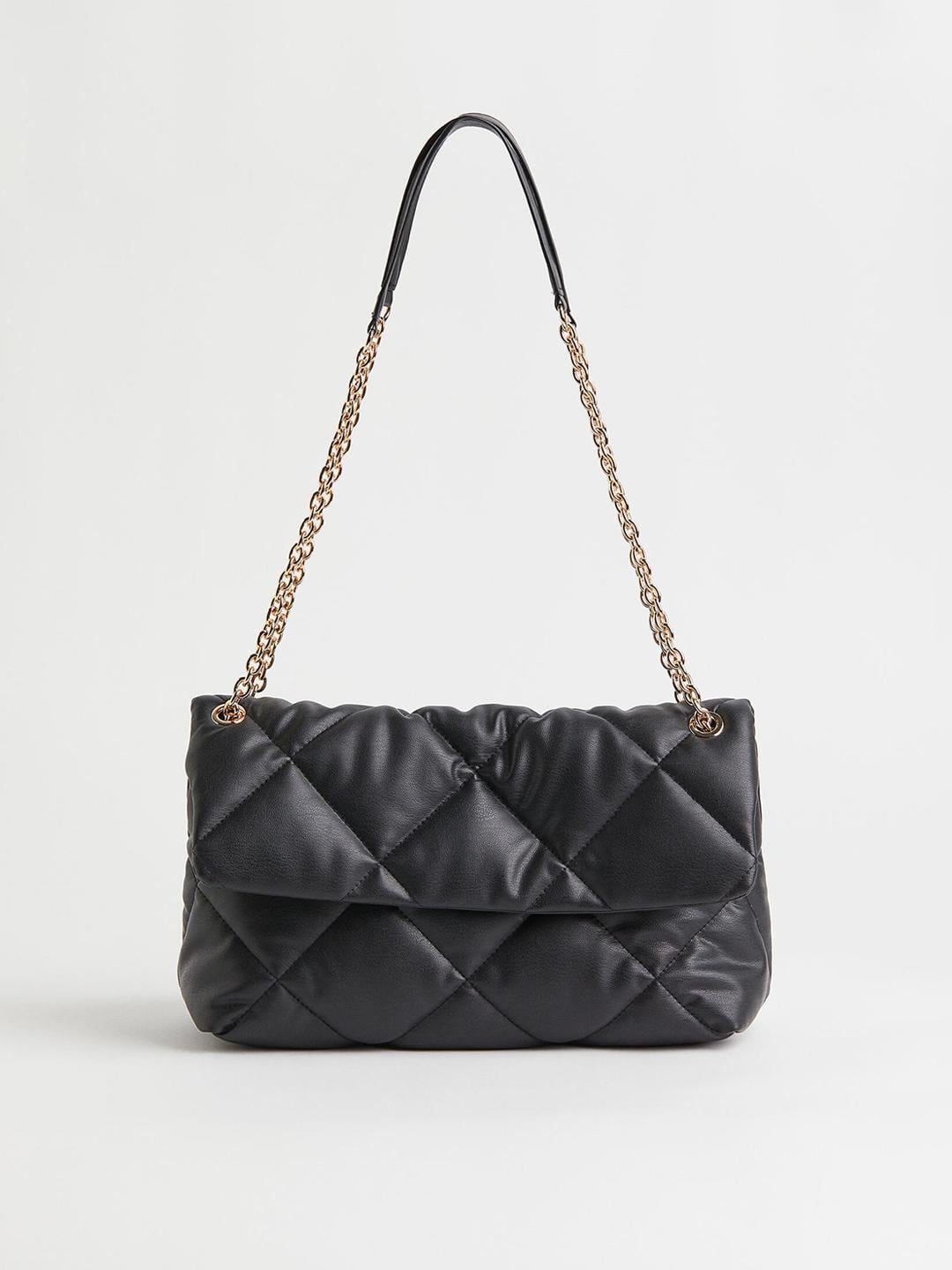 Quilted shoulder bag on a clean background