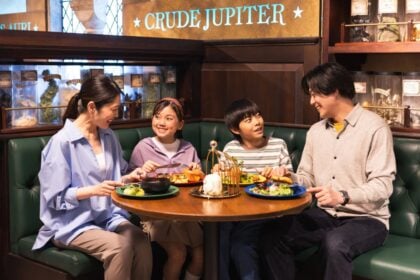 Family enjoying themed food at Warner Bros. Studio Tour Tokyo